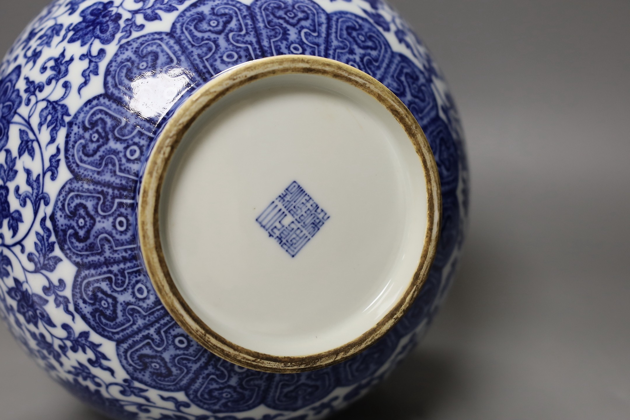 A Chinese blue and white bottle vase, Qianlong seal mark, 37cms high